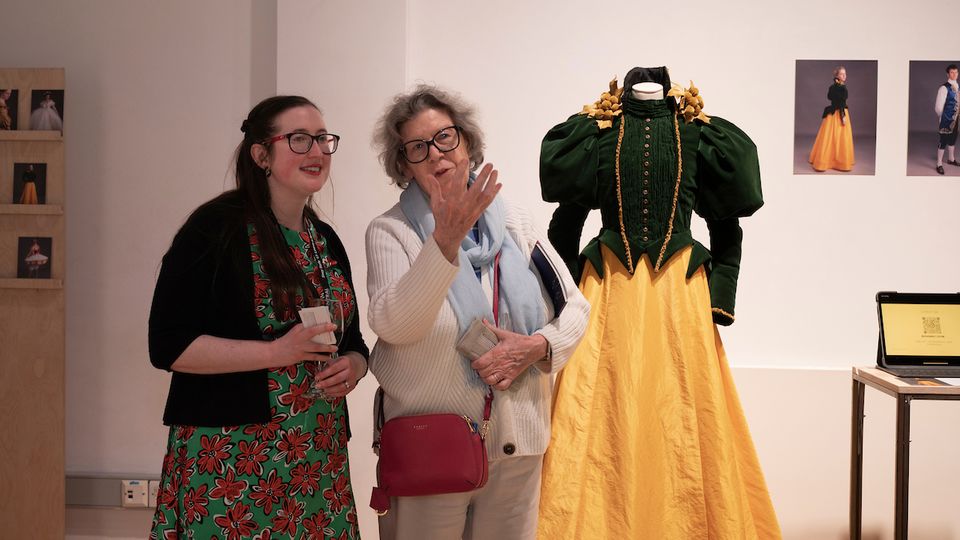 Two women at the BA Practice Exhibition Costume room