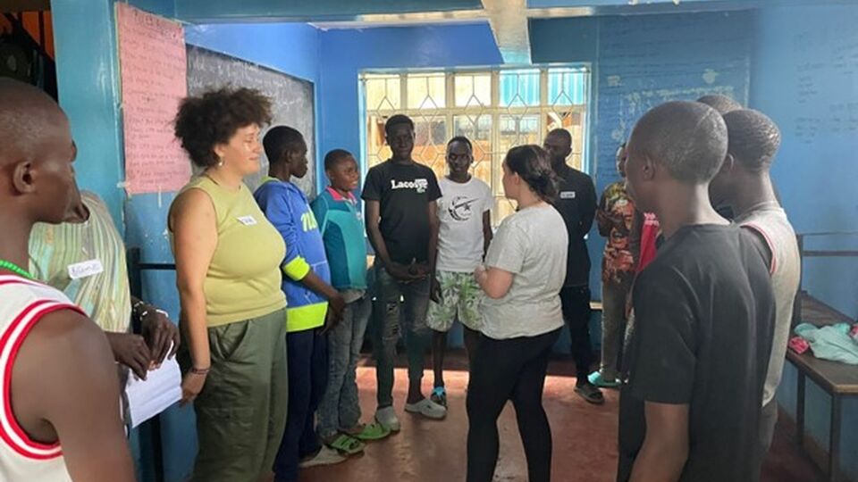 Central students facilitating a workshop with participants from Smiles Africa