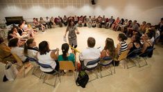 Maria Delgado delivering a workshop to Early Career Researchers at the annual conference of the International Federation for Theatre Research in Barcelona (2013). Photo: Institut del Teatre.