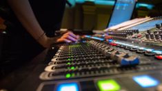 A Theatre Sound student mixing a show.