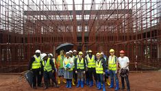 Engineers and construction site staff supervising works at the International School of Uganda