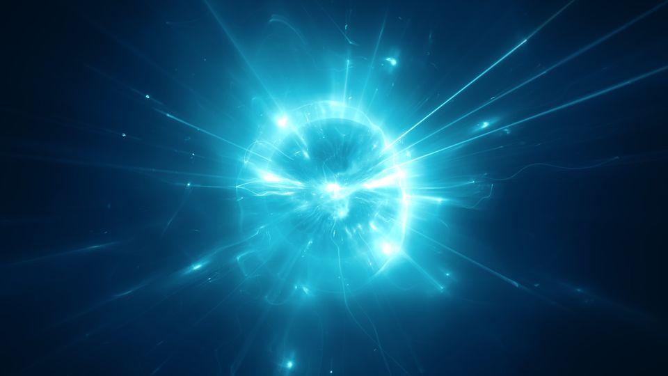 An explosion of blue light emanating from the centre of a dark background