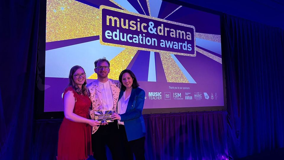 Rachel Hudspith, James Clarke and Nicola Abraham on stage at the 2022 Music and Drama Education Awards 