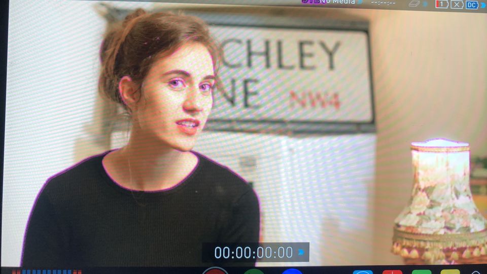 Photograph of still of Laura Kaliger on set of Finchley Lane, as displayed in a video player