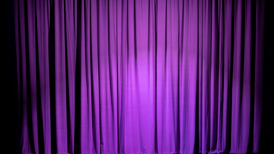 Purple curtains on a stage
