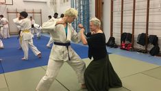 Naomi interviewing Iszi Lawrence in a dojo for a piece about suffragettes and jujitsu.for BBC Radio 4’s ‘Making History’