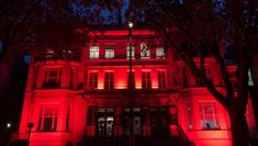 Students Light Central Red in Support of the #WeMakeEvents Campaign 