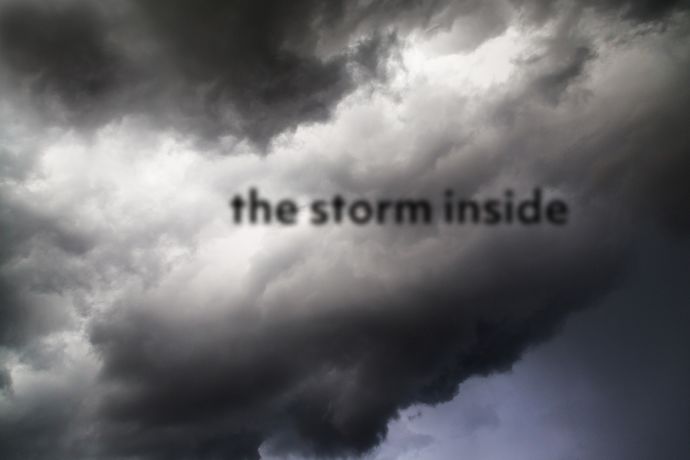 Storm clouds with the words 'the storm inside' overlaid in black text